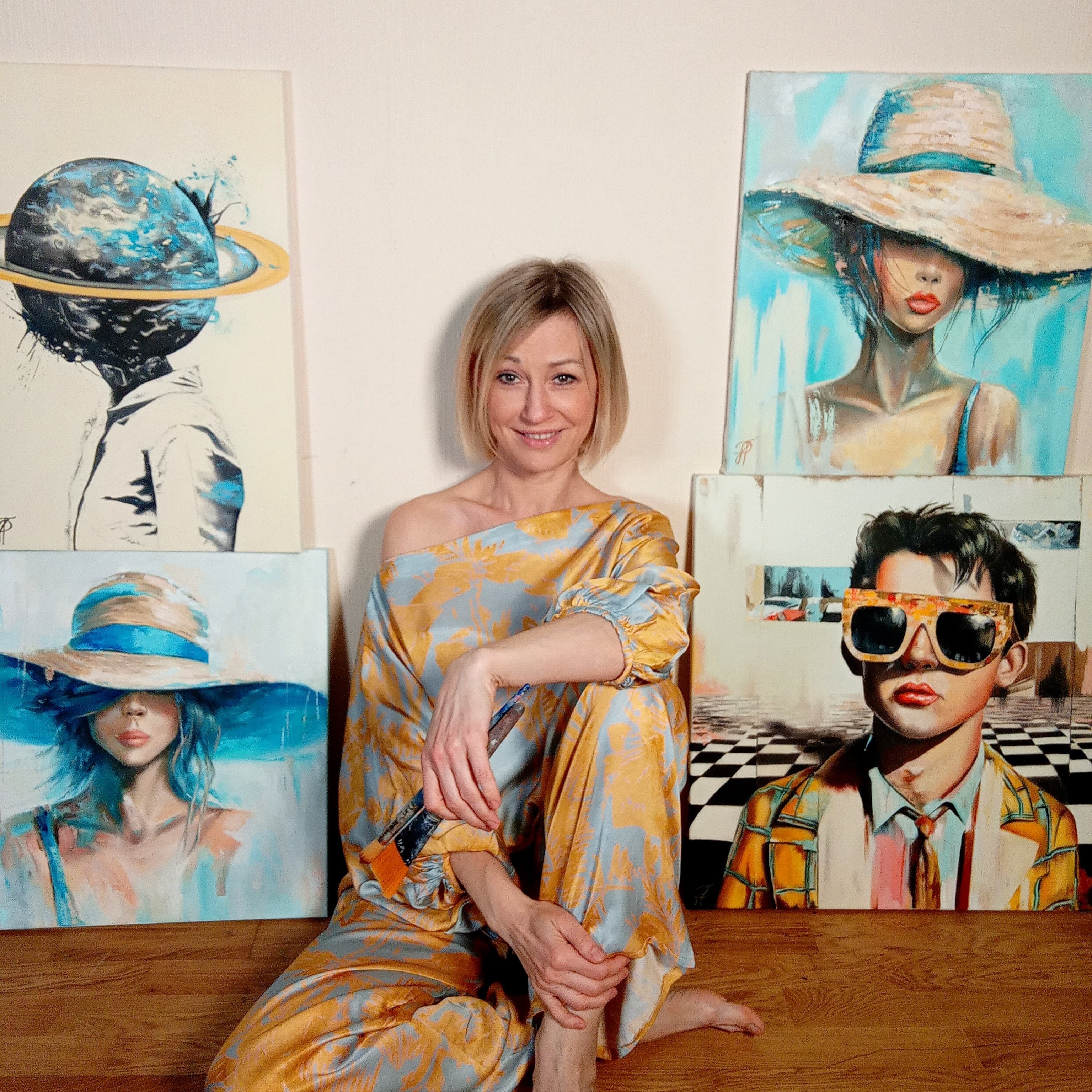 Julianna Tulinova in her art studio working on a new painting #ukrainianartist #artiststudio